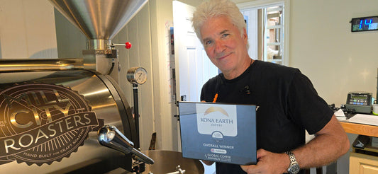 Kona Earth owner Steve Wynn holds Global Coffee Award